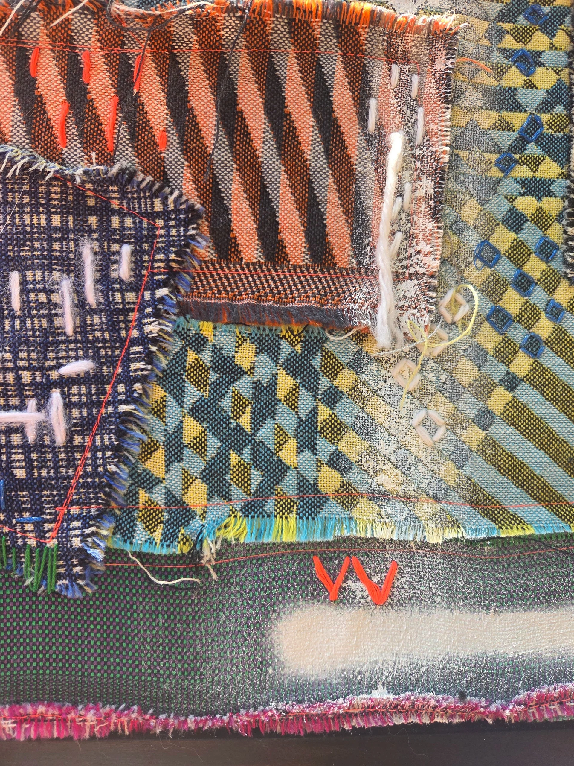 Close-up of colourful woven jacquard fragments with frayed edges